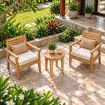 Solid teak round side table with slatted top in garden patio