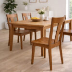 Front view of solid teak wood dining chair with geometric T-backrest design