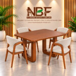Teakora dining set with four upholstered chairs displayed in the NBF furniture studio in Jepara Indonesia