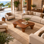 Organic teak coffee table displayed in a luxury living room with neutral seating