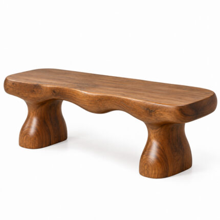 Side angle view of the Terra suar wood bench showing its flowing seat and sculptural legs