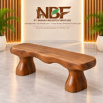 Terra sculptural suar wood bench displayed in the Niwara Bisoepo Furniture studio