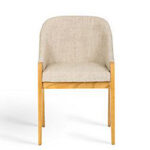 Front view of a Viva solid teak dining armchair with cushioned seat and upholstered curved backrest