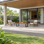 Woodcrest Suar wood coffee table with black metal legs in a contemporary living room