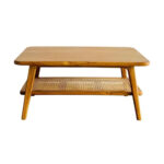Solid teak coffee table with woven rattan shelf front view
