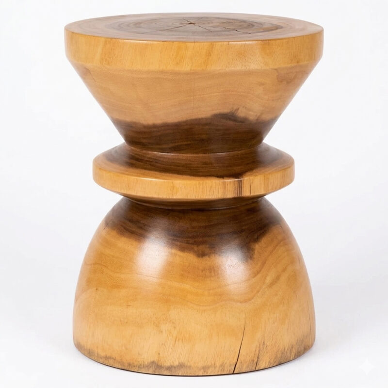 Zuma solid Suar wood accent stool showing its natural grain and rounded hourglass-inspired design